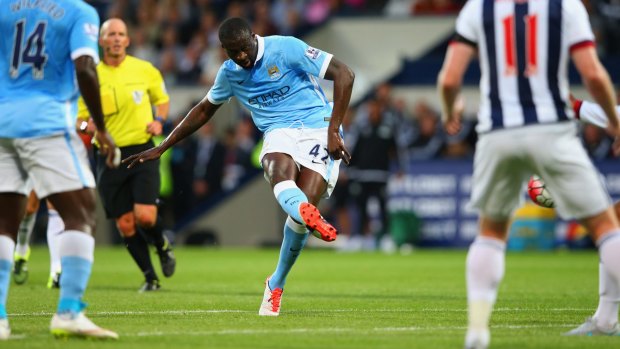 Yaya Toure curls in his second of the night.