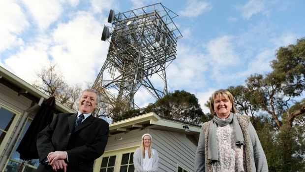 Philip Derham, Annie and Karen Merriel in front of the obsolete tower in Surrey Hills. 