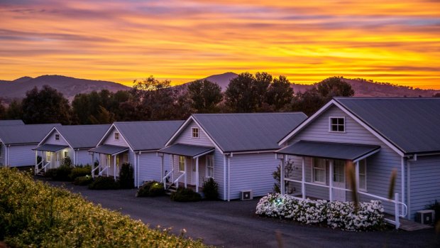 Sun sets over the riverside cottage accommodation at Nimbo Fork Lodge, Killimicat.

