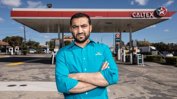 Ash Vatsa stands by the Caltex petrol station in Merrylands where he is the franchisee.