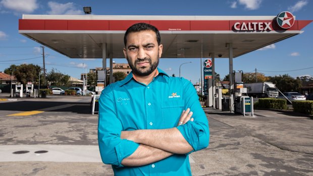 Ash Vatsa stands by the Caltex petrol station in Merrylands where he is the franchisee.