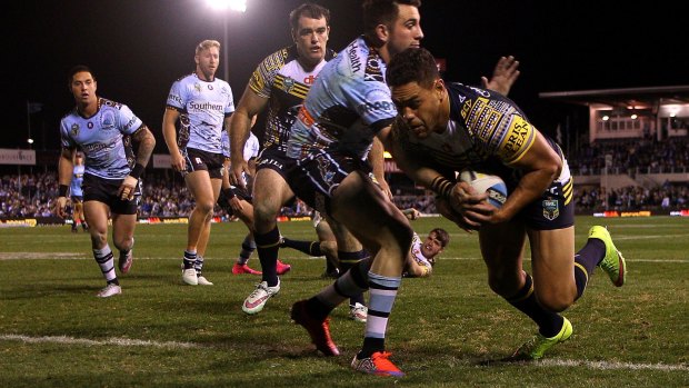 Slow starters: Antonio Winterstein scores a try during the round 22 NRL match between the Cronulla Sharks and the North Queensland Cowboys at Remondis Stadium.