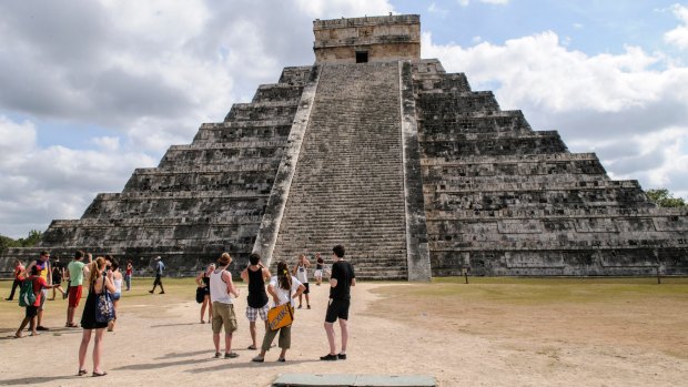 The Temple of Kukulkan (El Castillo) at Chichen Itza Archeological Zone, ruins of a major Maya civilization city in the heart of Mexico's Yucatan Peninsula. 