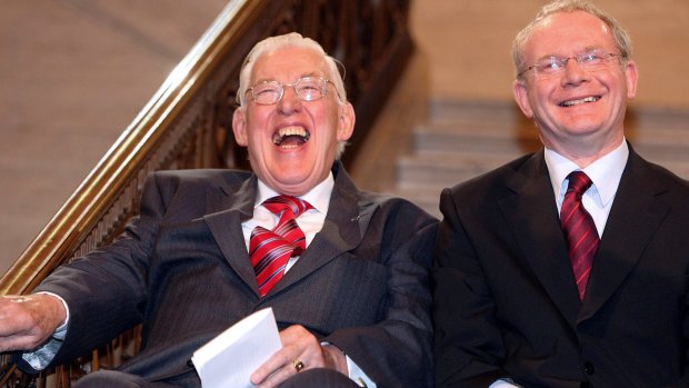 The late Ian Paisley shakes a joke with Martin McGuinness, once one of his most dealy enemies.
