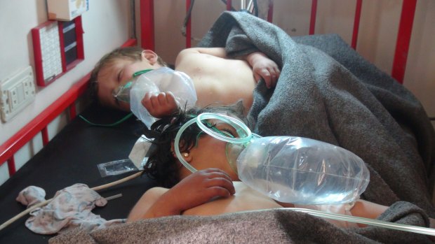 Young victims of the suspected chemical attack are treated in hospital.