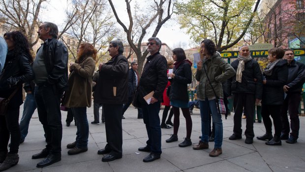 Queuing to vote in Madrid on Sunday. 