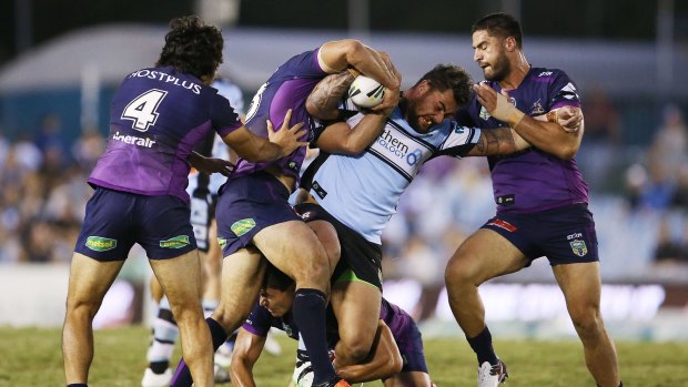 Grappling for the minor premiership: Cronulla Sharks and the Melbourne Storm go head to head on Saturday night.