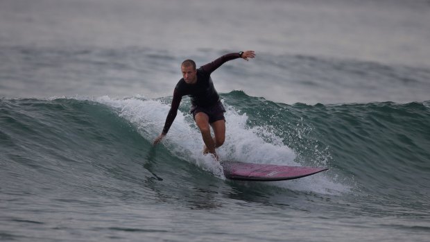 Matt Mulder was surfing on Tuesday when the shark swam up to him.