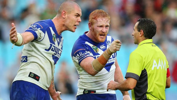 Bad dogs: David Klemmer and James Graham confront referee Gerard Sutton on Friday.