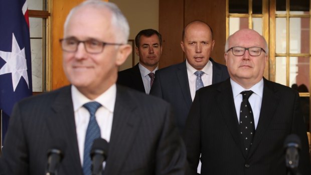 Prime Minister Malcolm Turnbull, Immigration Minister Peter Dutton and Attorney-General George Brandis.