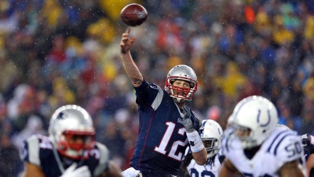 New England Patriots quarterback Tom Brady throws a touchdown pass against the Indianapolis Colts in the AFC Championship Game.