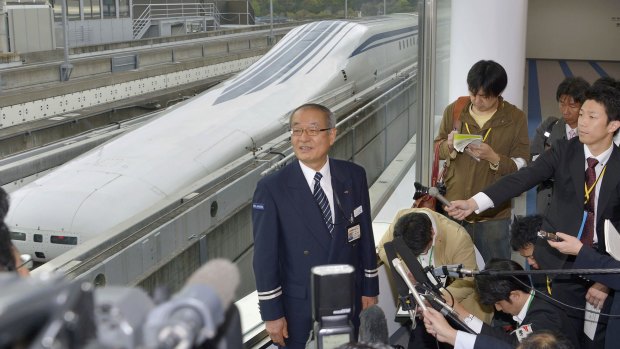 Yasukazu Endo, general manager of JR Central's Yamanashi Maglev Test Line Test Centre, answers a reporter's question after a Japanese maglev train broke its own speed record in Tsuru, reaching 603 kilometers per hour.