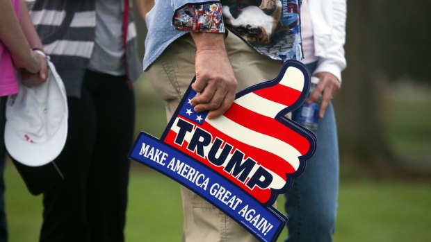 A supporter holds a Trump sign during a Donald Trump rally in Hickory, North Carolina. 