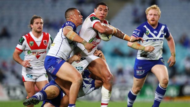 Hard to handle: Tyson Frizell breaks the Bulldogs defence during the round 21 NRL match between Canterbury and the St George Illawarra Dragons at ANZ Stadium.