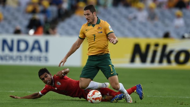 Into the last eight: Matthew Leckie and the Socceroos thrashed Oman 4-0.