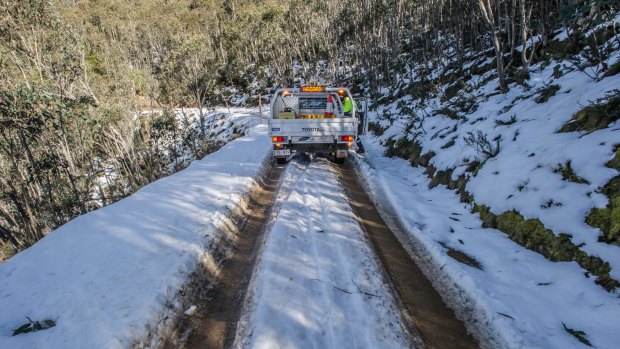 Transport Canberra and City Services? Project Officer Adam Melville looks after icy or snow affected roads in the Namadgi National Park area (near the Mount Franklin chalet site) Photo by Karleen Minney.