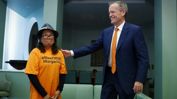 Opposition Leader Bill Shorten meets with hotel cleaner Margarita Murray-Stark in his office at Parliament House on Thursday.