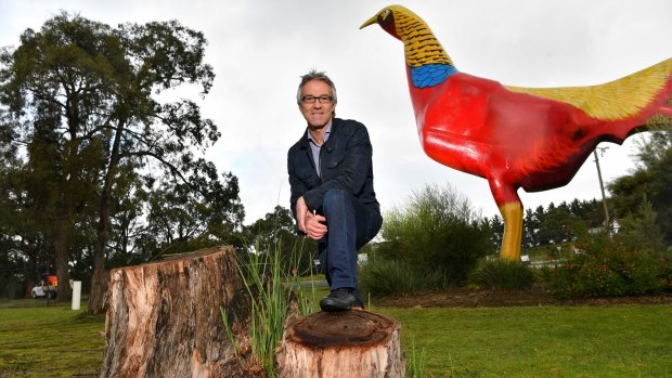 Build it and they will come: Ron Weinzierl in front of the park's famous golden pheasant sculpture.