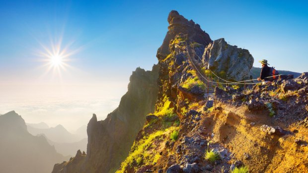 Mountain hiking trail from Pico do Arieiro to Pico Ruivo, Madeira, Portugal.