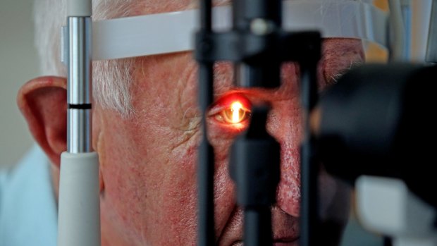 Bionic eye: Ray Flynn has his sight checked by surgeon Paulo Stanga.