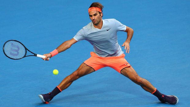 Roger Federer stretches to play a forehand to Alexander Zverev of Germany during the men's singles match on day four of the 2017 Hopman Cup at Perth Arena.