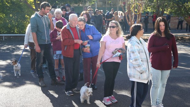 A long queue of voters at the East Gosford Public School in the electorate of Robertson in Gosford, Central Coast.