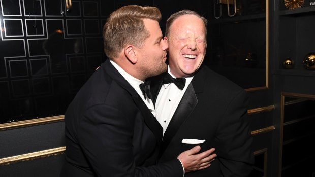 James Corden has sort of apologised for his controversial kiss with Sean Spicer at Monday's Emmy Awards.