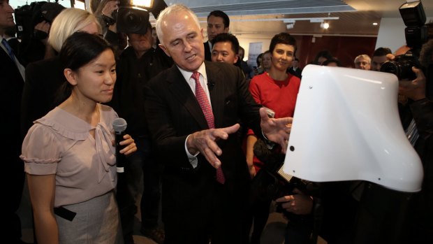 Mr Turnbull with the Teleport robot developed by Marita Cheng at Engineers Australia in Melbourne on Monday.