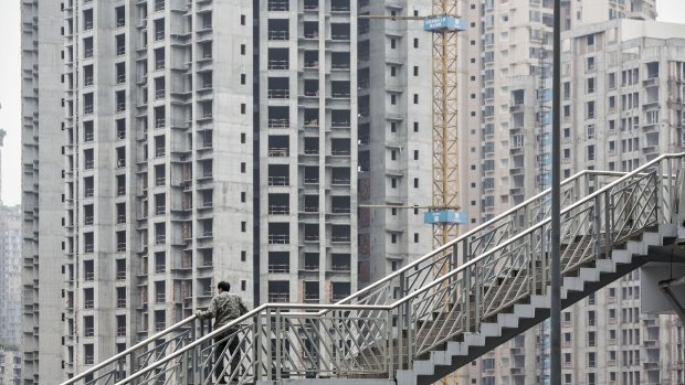 Growth in residential buildings under construction in China continues, but policymakers think that will ease. 