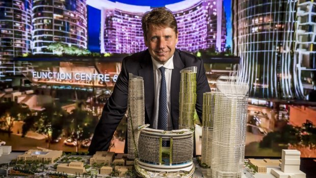 Echo Entertainment chief executive Matthew Bekier with a model of the new Brisbane waterfront casino.