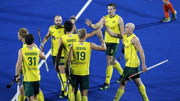 Gold medal chance: Australian players celebrate after scoring their winning goal against the Netherlands.