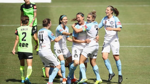 Melbourne City W-League players celebrate after Laura Alleway scores.