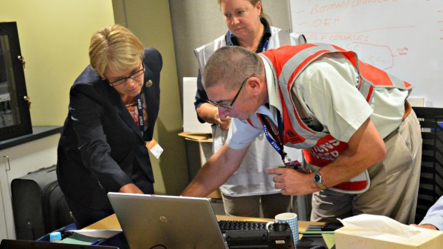 NSW Minister for Primary Industries, Katrina Hodgkinson, with eradication staff on Monday.