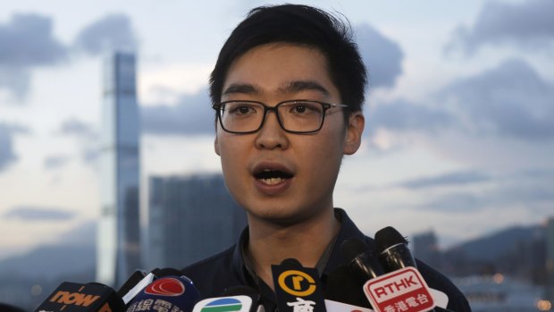Chan Ho-tin of the Hong Kong Nationalist Party speaks to the media in July. He has been barred from running in elections.