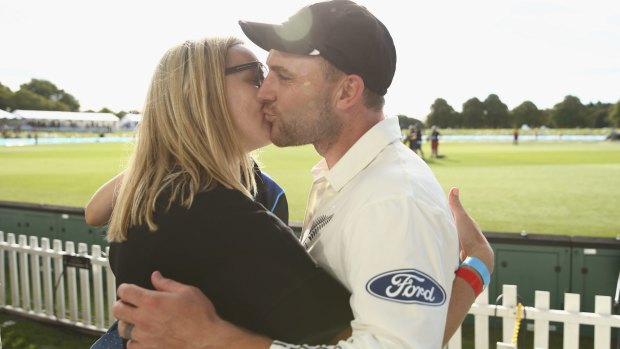 McCullum is congratulated by his wife, Ellissa.