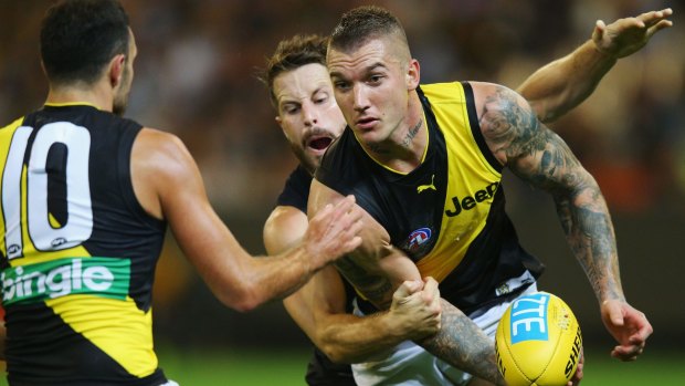 Sharp: Tigers star Dustin Martin showed the way with his speed and skills against the Blues.