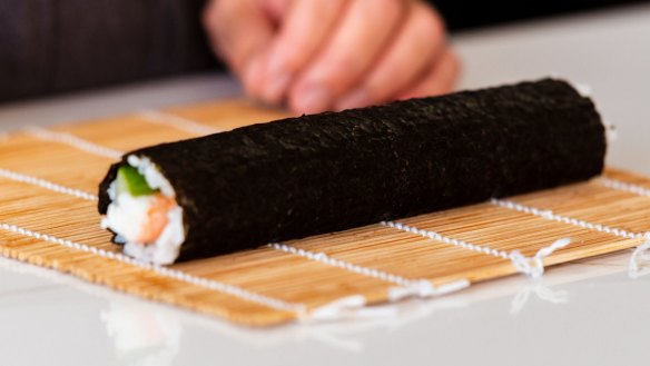 Step-by-step sushi rolls.
Step 5. Once the sushi roll is rolled up inside the bamboo mat, press it together firmly with both hands to neaten, then gently remove the bamboo mat.
Pic credit: Nagi Maehashi
For Good Food, April 26, 2022