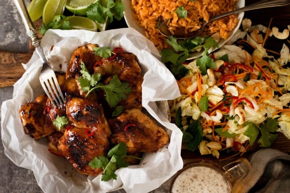 Vietnamese lemongrass chicken with red rice and coleslaw.