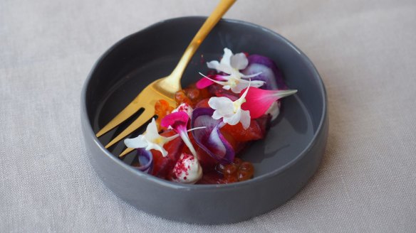 A portion of sparkling shiraz-cured trout.