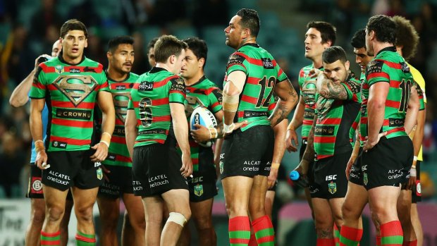 Stunned: Souths were powerless to stop the red-hot Broncos.