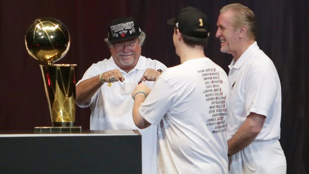 Glory days: Micky Arison, his son Nick and Pat Riley celebrate the NBA Championship victory rally at the AmericanAirlines Arena on June 24, 2013 in Miami after the Heat defeated the San Antonio Spurs in the NBA Finals.  