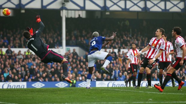 Everton's Arouna Kone heads the ball past Sunderland goalkeeper Costel Pantilimon to complete a hat-trick at Goodison Park on Sunday.