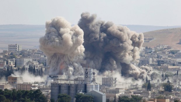 The aftermath of a US-led air strike in the Syrian town of Kobani last year.
