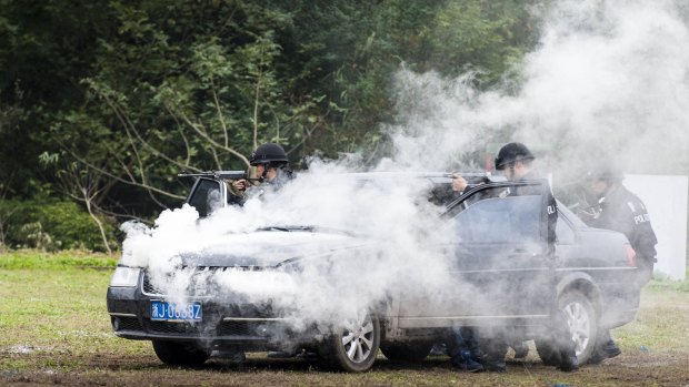 Special police attend an anti-terrorism drill in Taizhou, Zhejiang Province, China on Friday.