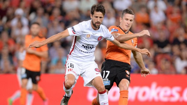 Tangle:  Andreu is challenged by Matt McKay during the round 22 A-League match between the Brisbane Roar and the Western Sydney Wanderers at Suncorp Stadium.