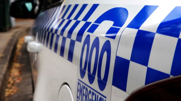 A Mitcham man is in hospital after being stabbed outside his home. 