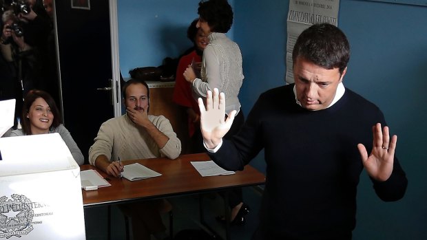 Italian Premier Matteo Renzi gesticulates after casting his ballot at a polling station in Pontassieve, Italy, on Sunday.