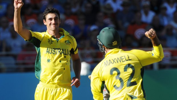 Golden boy: Mitchell Starc celebrates the wicket of  Ross Taylor.