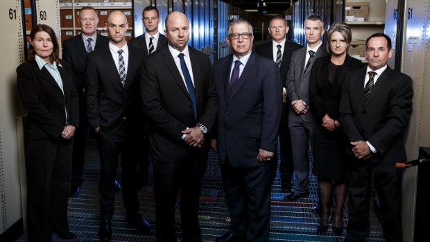 Detective Senior Sergeant Peter Trichias, fifth from left, with his Homicide Squad Cold Case Team. 