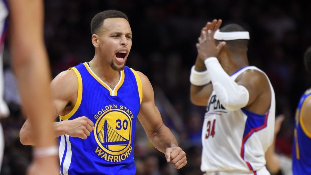Pumped: Golden State Warriors guard Stephen Curry celebrates during the win over the Los Angeles Clippers.
